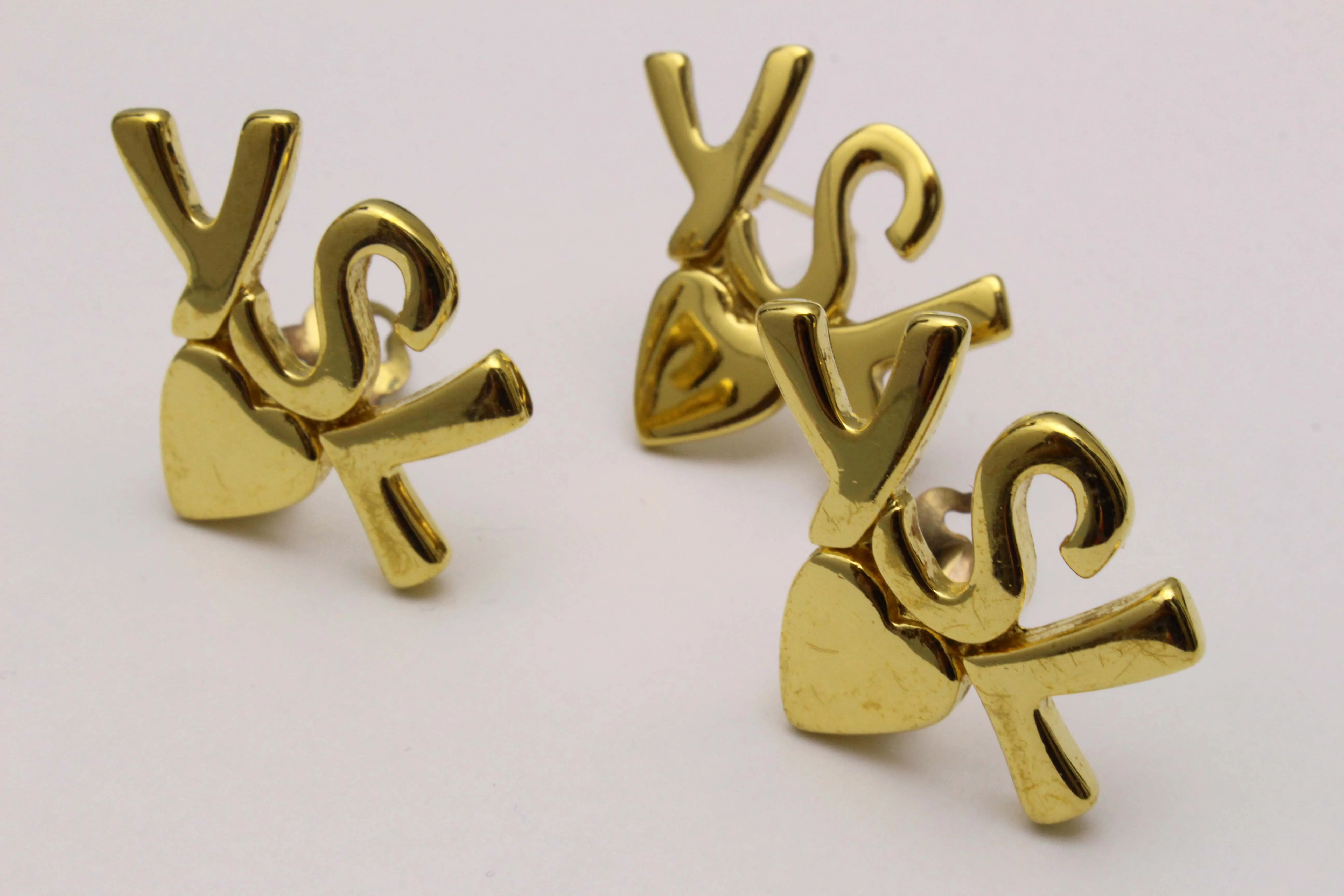 YVES SAINT LAURENT initials over heart set