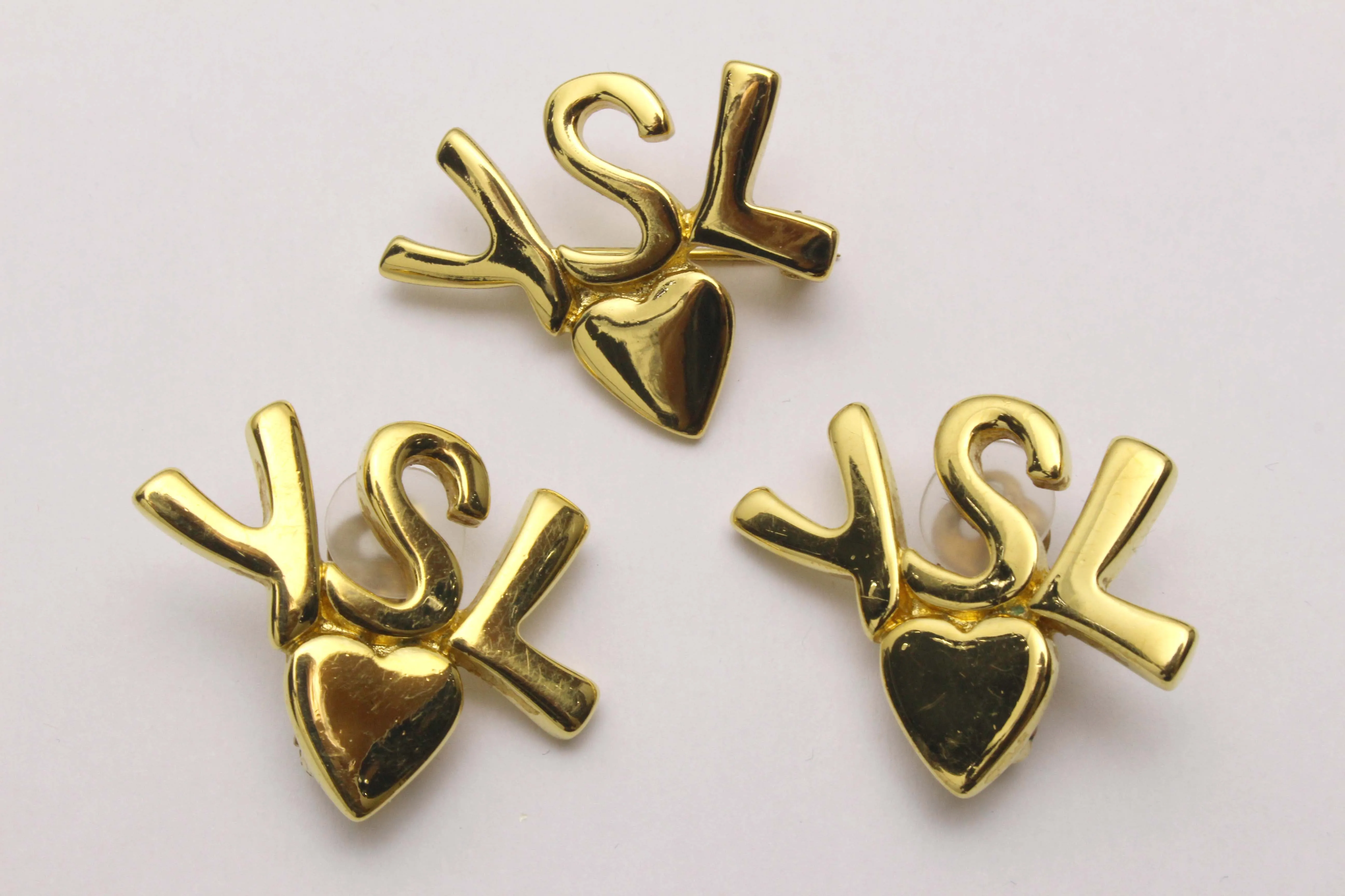 YVES SAINT LAURENT initials over heart set