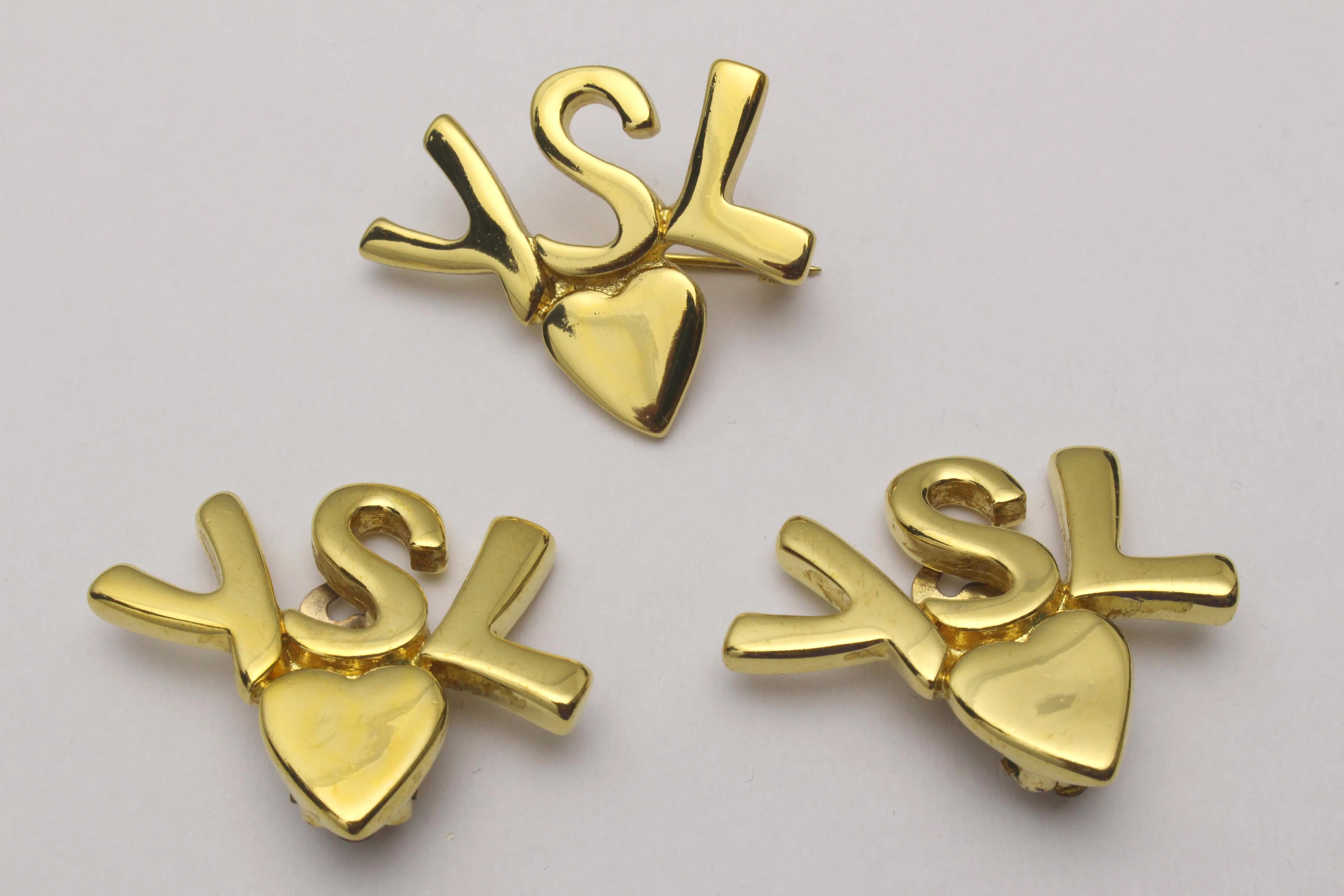 YVES SAINT LAURENT initials over heart set