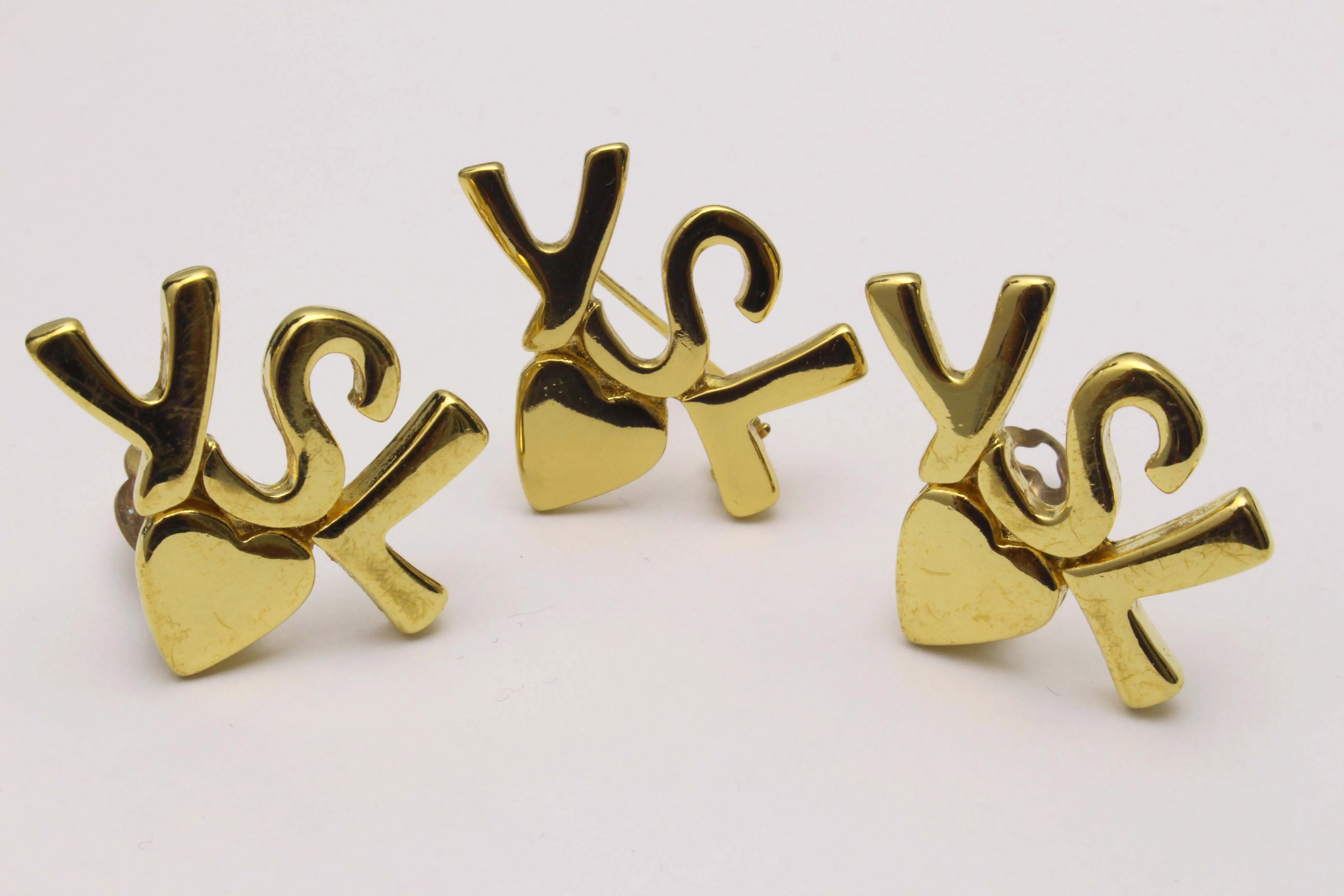 YVES SAINT LAURENT initials over heart set